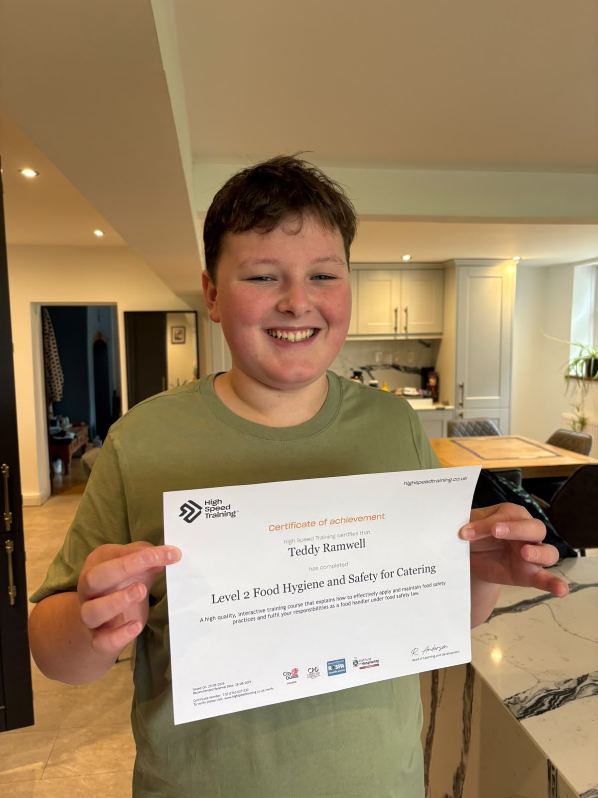 Ted holding his Level 2 Food Hygiene and Safety for Catering certificate